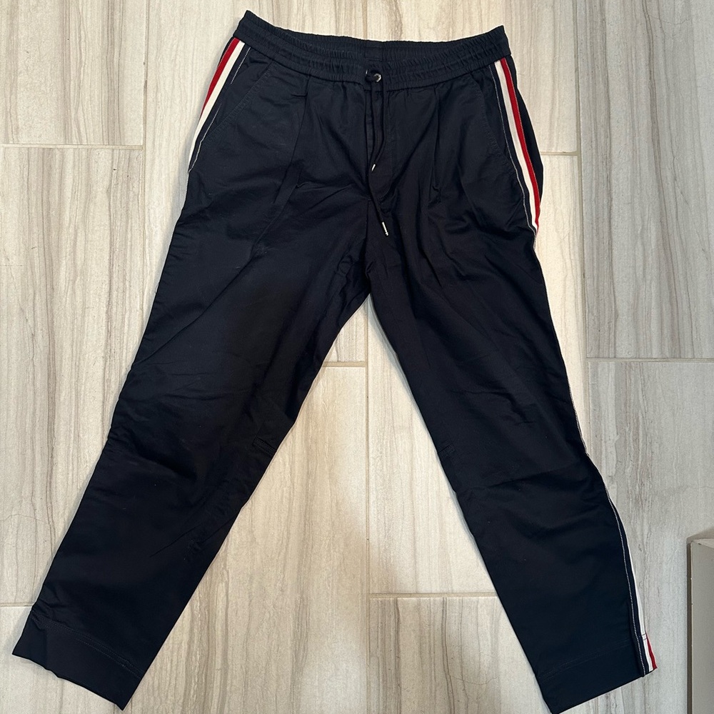 Moncler dark navy Joggers with tri-color stripe.